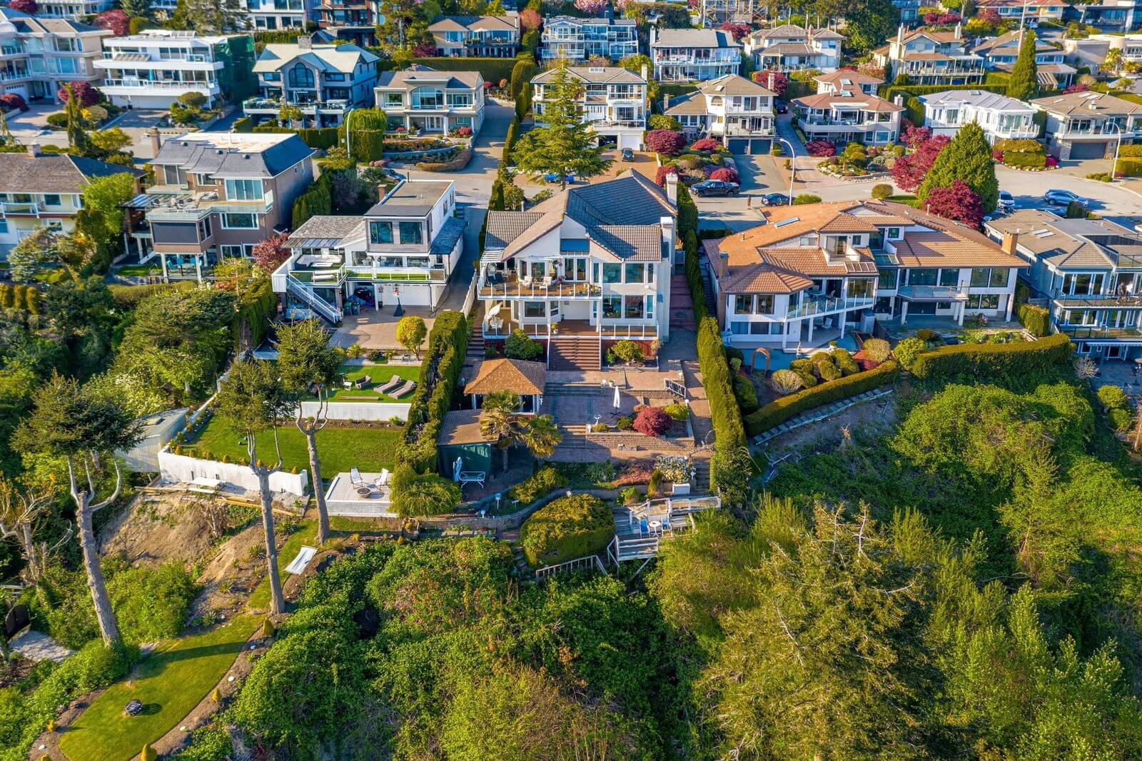 Aerial drone photo of waterfront property in South Surrey, BC.