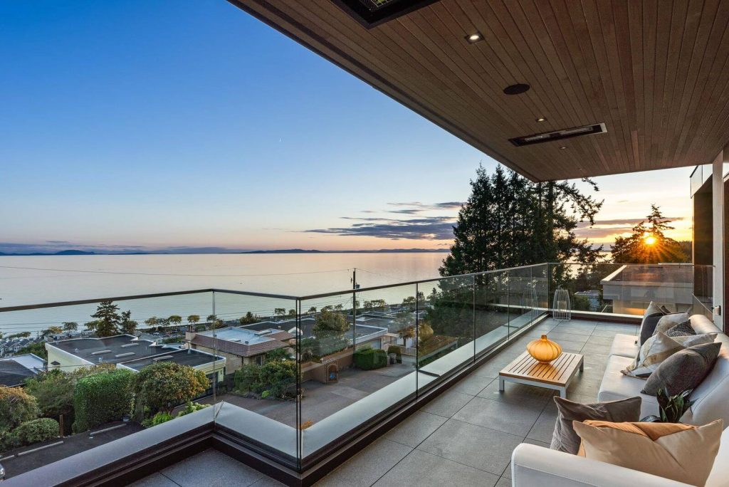 Twilight photo of waterfront property in White Rock, BC